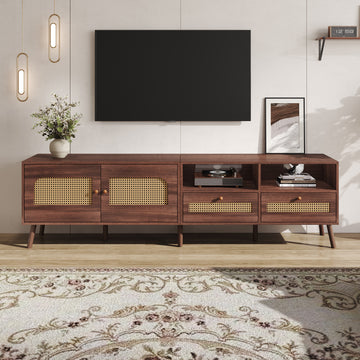 Wooden TV stand with decorative elements in a living room setting